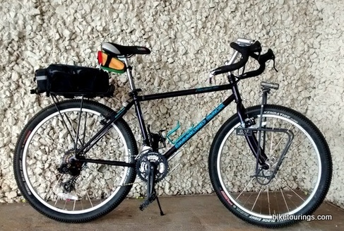 Picture of gravel background and touring bike for gravel roads