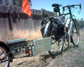 Nashbar cargo trailer used to advertise bicycle repair