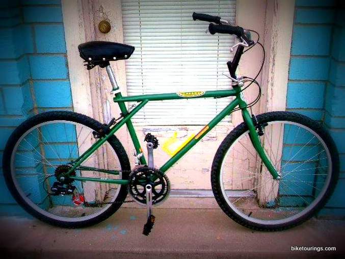 Picture of an old GT mountain bike frame converted to comfy commuter bike