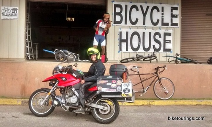 Picture of Bike Touring Enthusiast Niki Rellon on her new touring bike at the Bicycle House