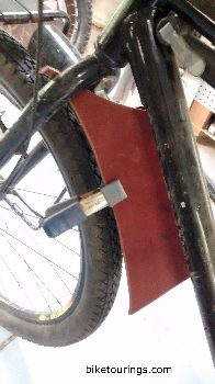 Picture of making leather fender mudflap for commuter bike fender
