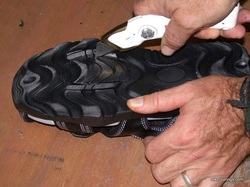 Picture of preparing Nashbar cycling sandals for cleats.