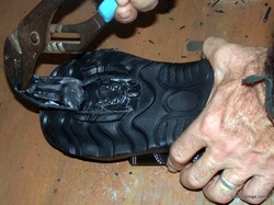 Picture of preparing Nashbar cycling sandals for cleats.