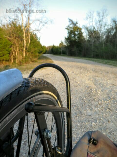 Picture of Schwalbe Mondial tires on touring bike riding gravel road