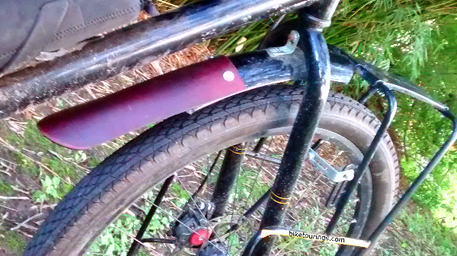 Picture of leather fender mud flaps for bike commuting
