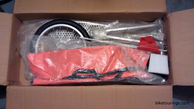 Picture of aosom single wheel bike trailer packaged in box