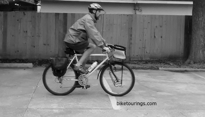 Picture of bike commuter with rain jacket cycling apparel