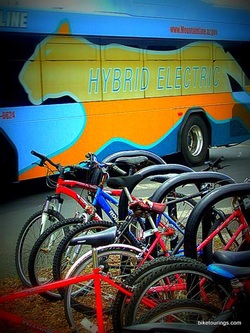 Picture of hybrid electric bus and bicycle rack for bicycle commuting